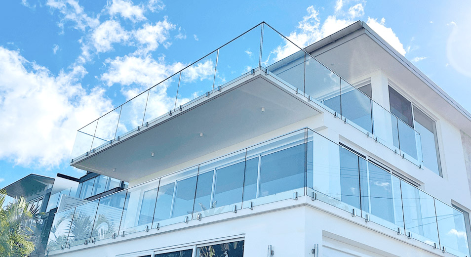 Glass Railings with Fascia Mounted Spigots with Top Cap Rails