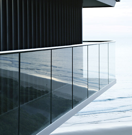 Glass Railings with Fascia Mounted U-Channel with Top Cap Rails