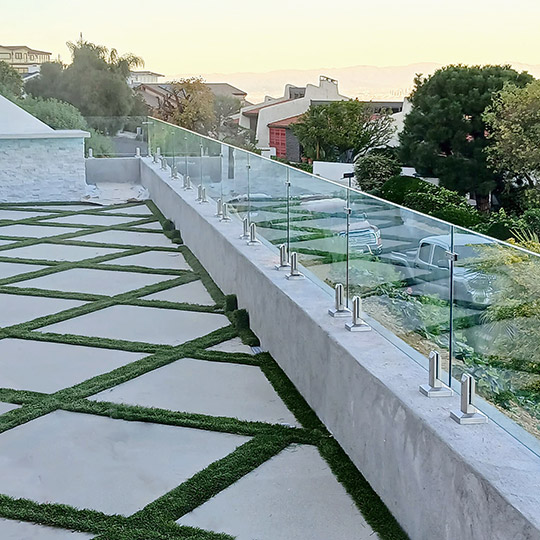 Glass Railings with Top Mounted Spigots without Top Cap Rails by LA Railings