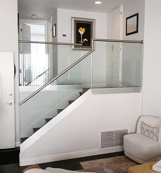 Glass Railings with Top Mounted U-Channel and Top Cap Rails by LA Railings