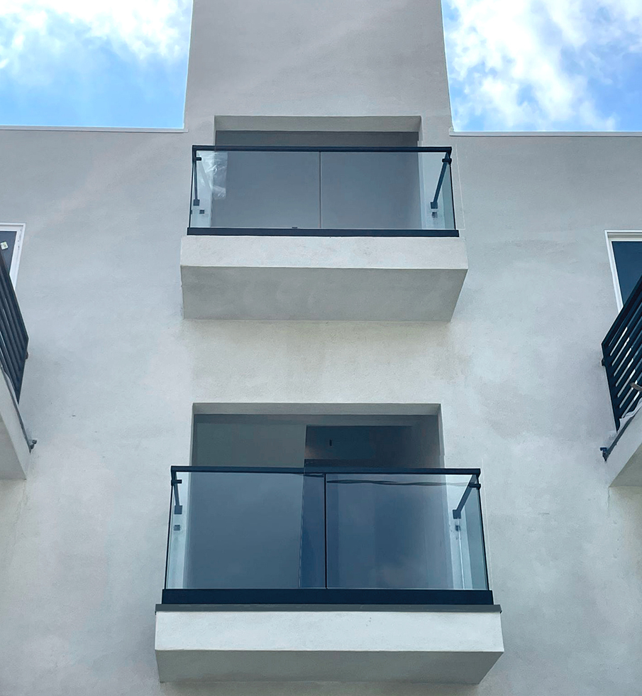 Glass Railings with Top Mounted U-Channel and Top Cap Rails by LA Railings