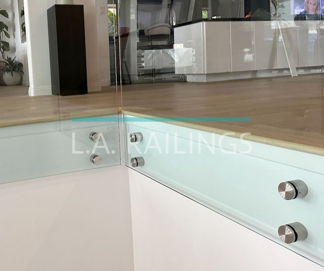 Fascia-mounted glass railings by LA Railings
